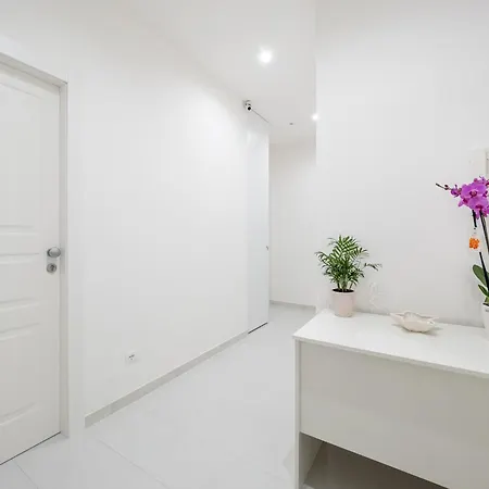 Pusisò - De Vivo Realty