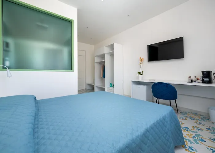 Pusisò - De Vivo Realty