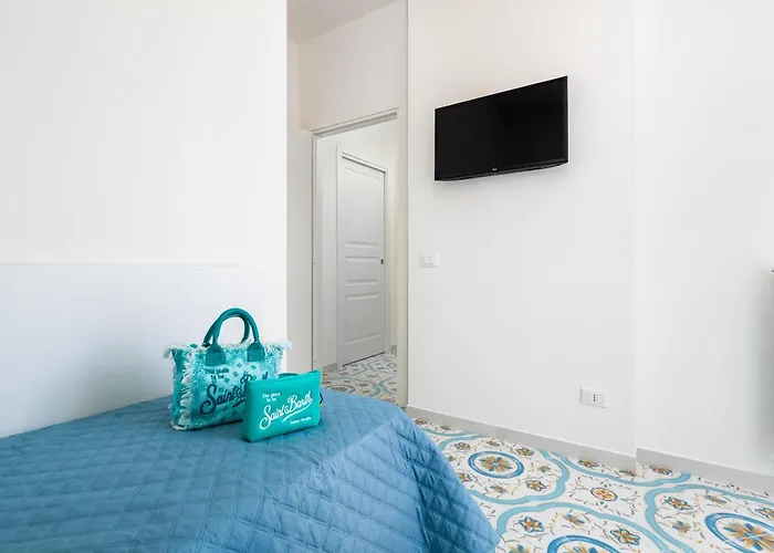 Pusisò - De Vivo Realty