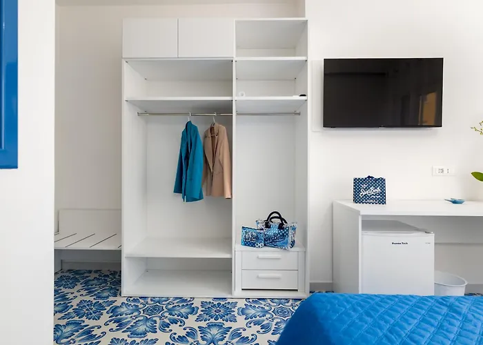 Pusisò - De Vivo Realty Affittacamere